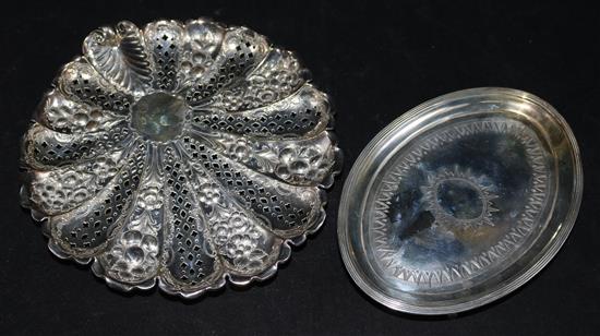 A pierced and embossed silver leaf-shaped dish, Sheffield 1898, James Dixon & Sons and a George III oval silver teapot stand,